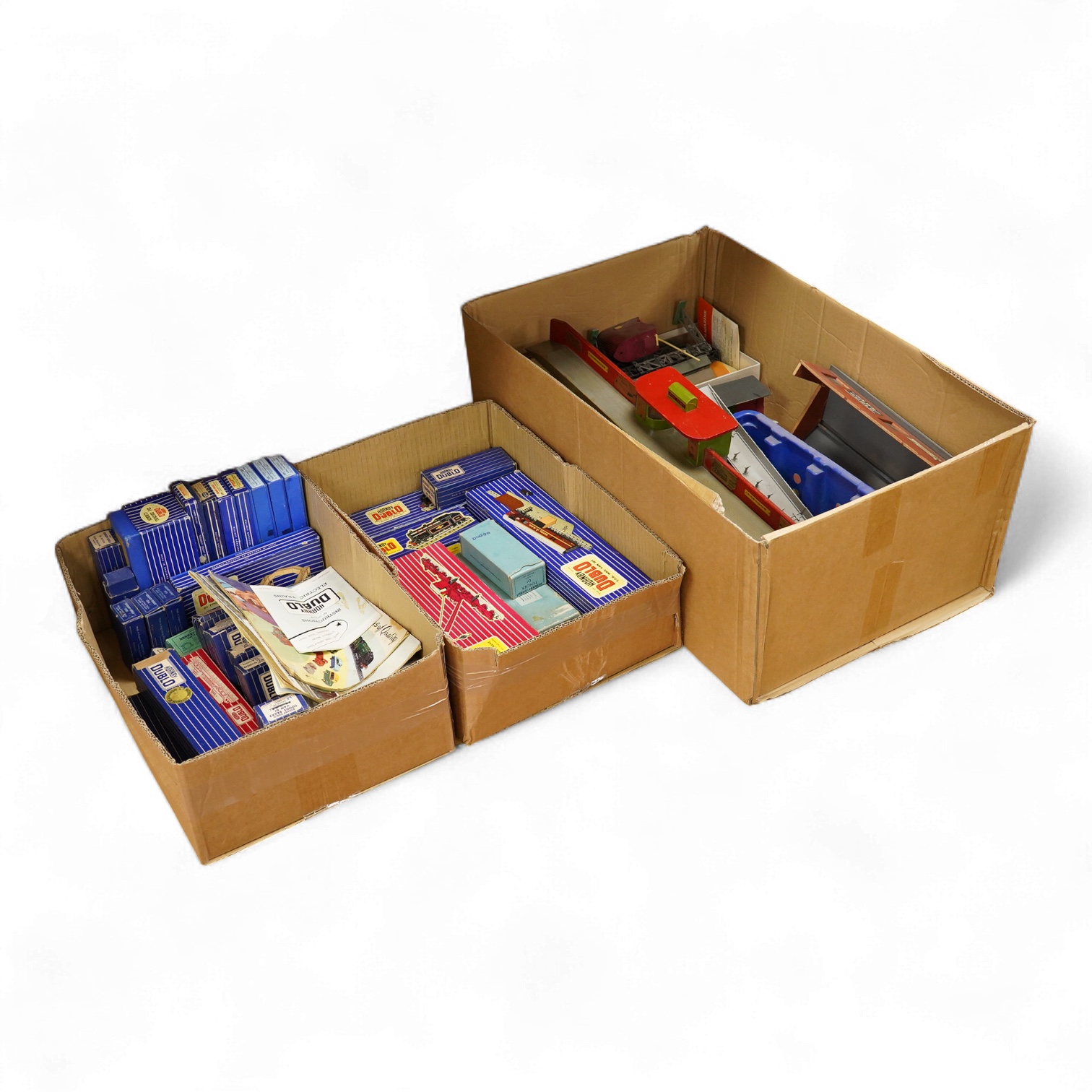 A collection of Hornby Dublo railway for 3-rail running, including three boxed locomotives; an LNER class A4 4-6-2 tender locomotive, Sir Nigel Gresley 7 (EDL1), a BR Duchess of Montrose 46232 (EDL12), and a BR class N2